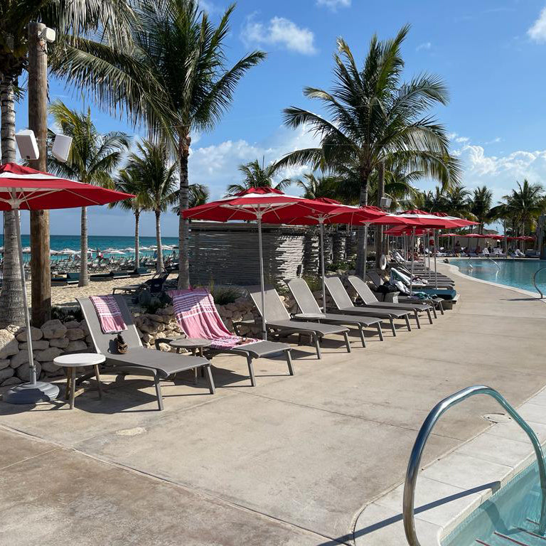 Sunset Chaise Lounges in a row by the pool at Bimini Beach Club