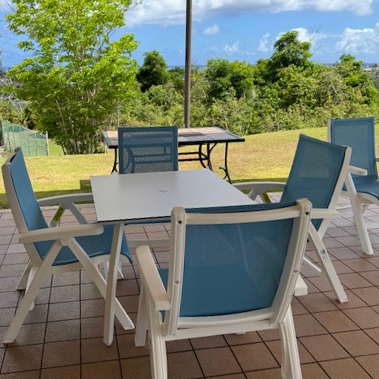 An up close look at the folding chairs under the pavilion at Holiday Tower Condos