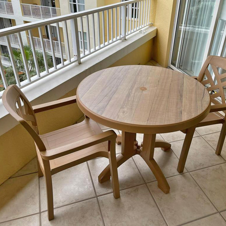 A close shot of the Aquaba table shows its realistic wood film decor