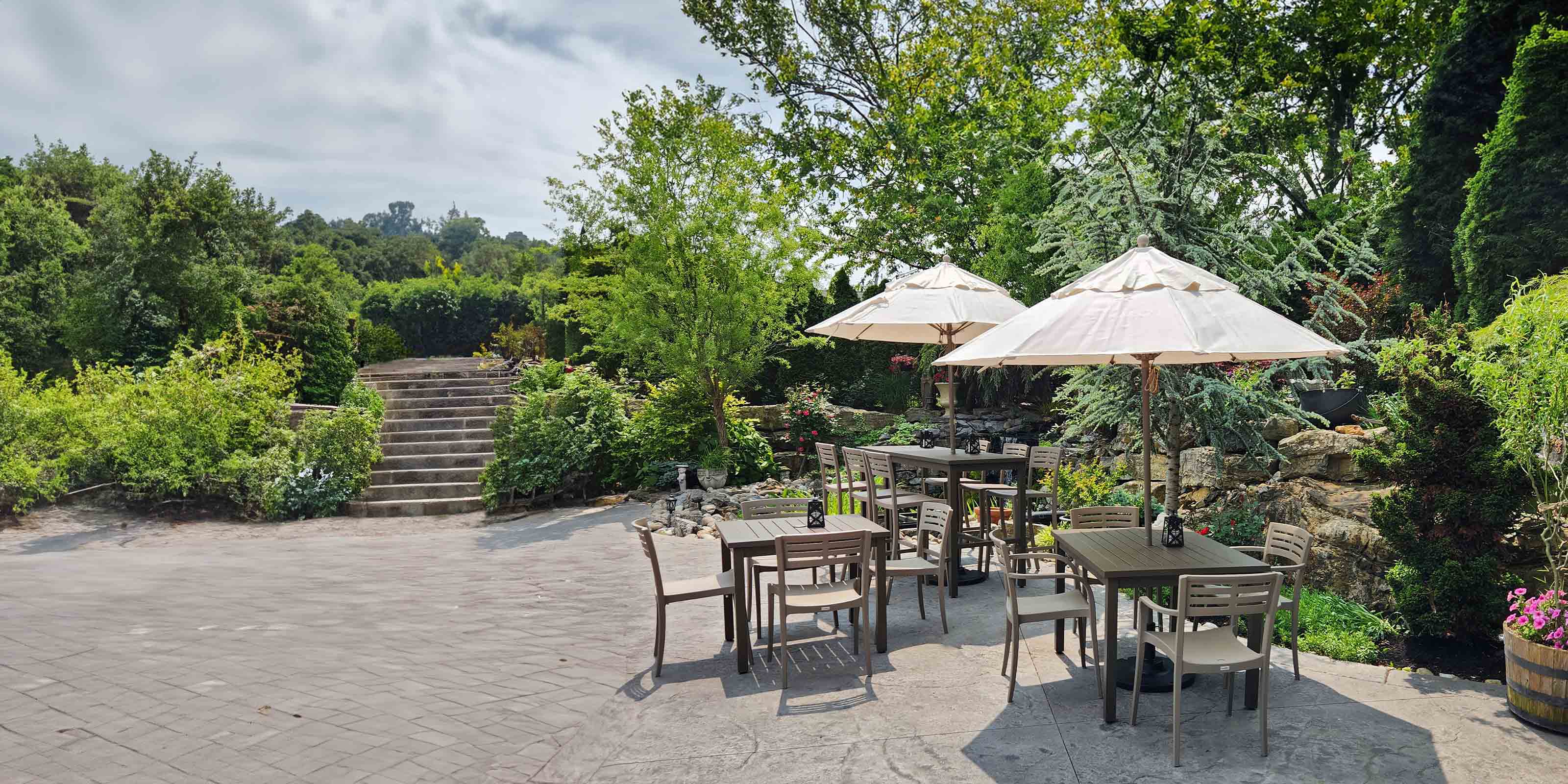 Umbrellas provide shade to outdoor patio dining